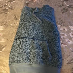 Gap in a size small, fuzzy material and is in good condition